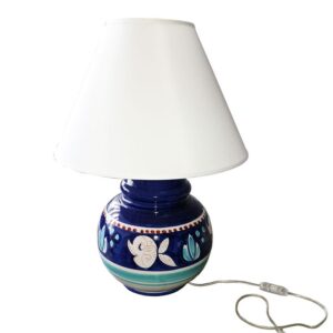 lume in ceramica con decorazioni pesci e fiori