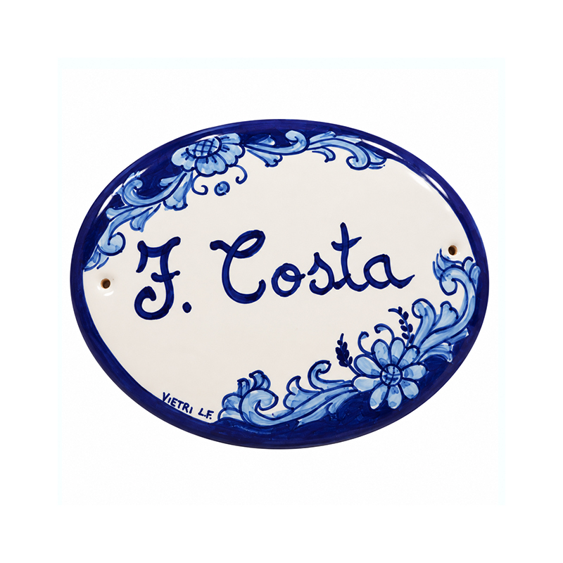 Targa in ceramica ovale con decorazione fiori blu